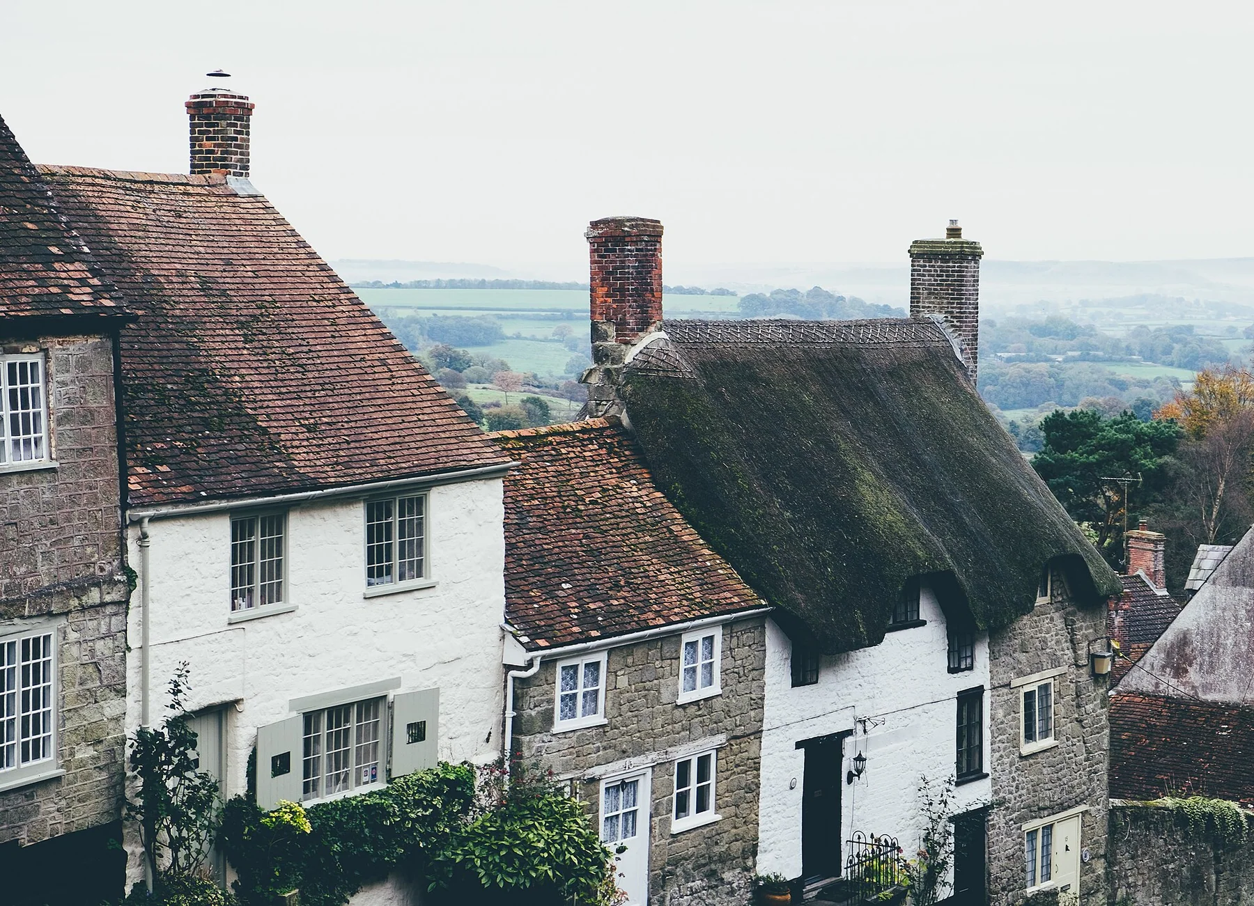 A row of stone and thatched houses on Gold Hill